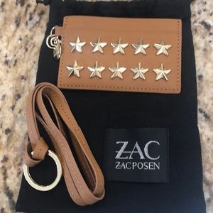 Zac Zac posen tan hard holder with gold stars